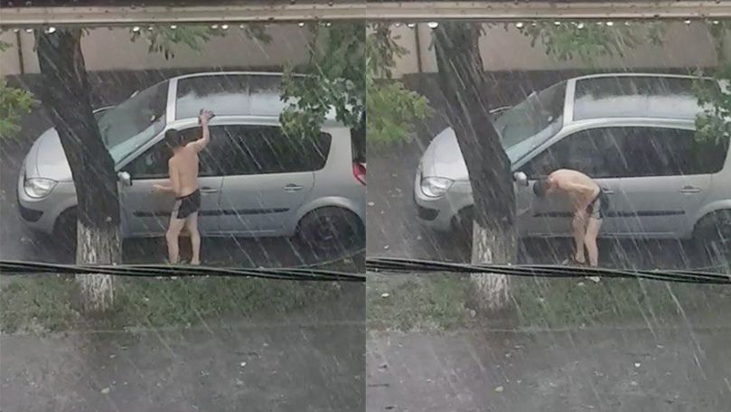 В Кишиневе мужчина воспользовался ливнем, чтобы вымыть машину.