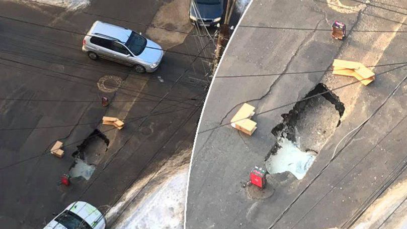 Образовавшуюся яму в центре Кишинева огородили картонными коробками .