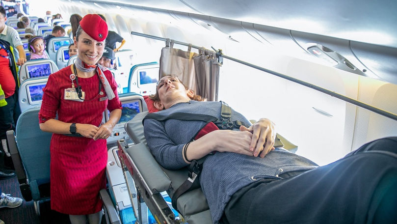 Cea mai înaltă femeie achită șase locuri în avion pentru a călători