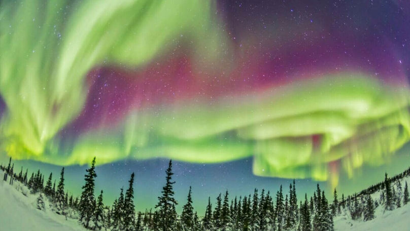 Orășelul unde se vede aurora boreală 300 de nopți pe an