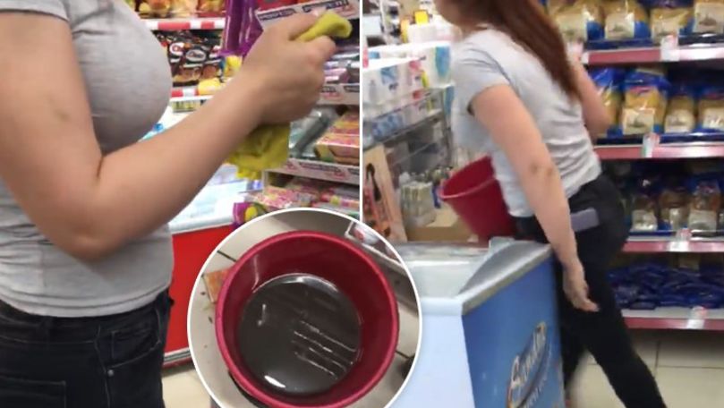 Angajata unui supermarket, filmată cum spală dulciurile cu apă murdară