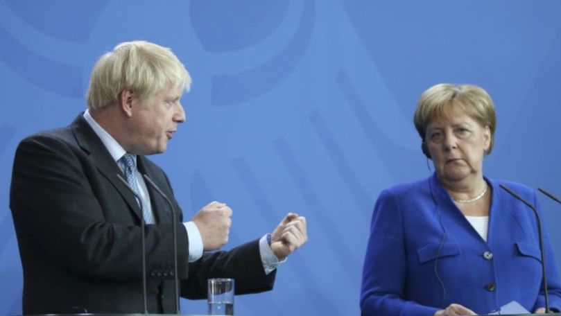 Avertismentul lui Merkel pentru Boris Johnson: Este extrem de improbabil