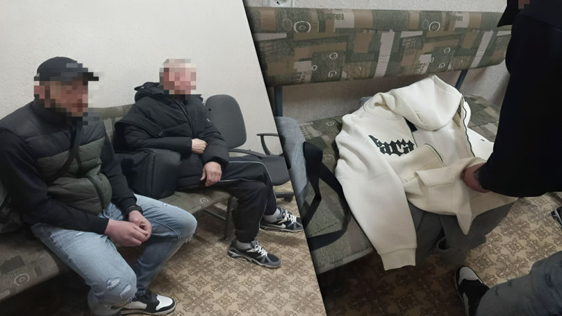 Doi bărbați, prinși de carabinieri cu genți pline cu haine furate
