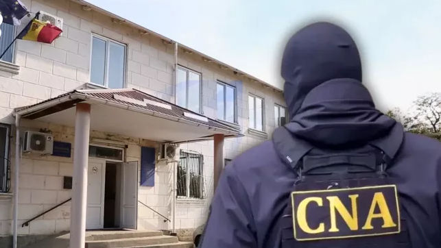 Percheziții la Primăria Durlești într-un dosar privind delapidarea terenurilor publice.