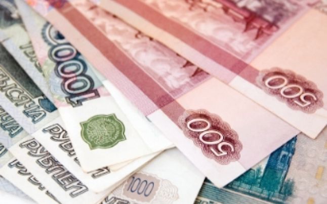 Moldovenii care muncesc în străinătate trimit tot mai puțin bani acasă. Foto: publika.md