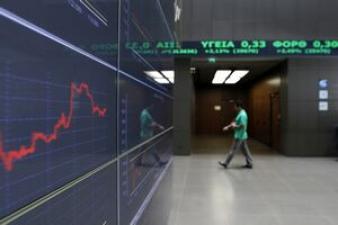 Акции самих греческих банков потеряли в среднем около 10%. Фото: cotidianul.ro