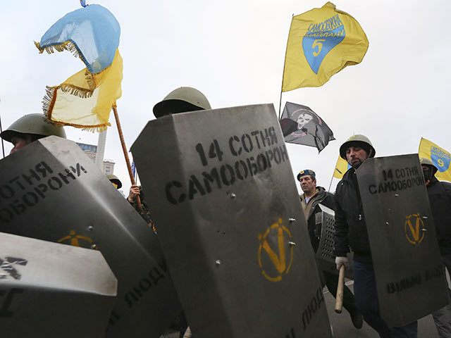 Украинская оппозиция готова освободить здания в центре Киева и разобрать часть баррикад. Фото: Reuters