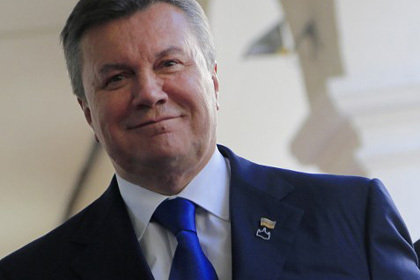 Президент Украины Виктор Янукович подписал поправки к Налоговому кодексу, которые могут лишить лидера партии УДАР Виталия Кличко права участвовать в предстоящих выборах главы государства. Фото: Alexander Klein / AFP