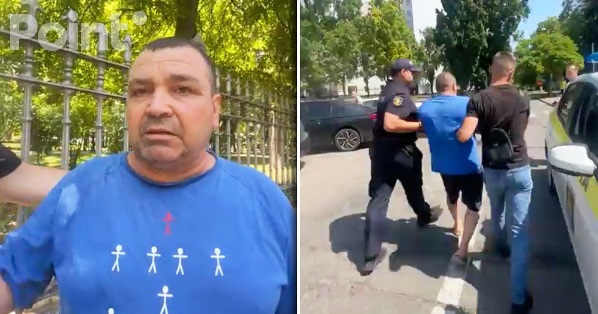 Un participant la mitingul opoziției, reținut de polițiști.