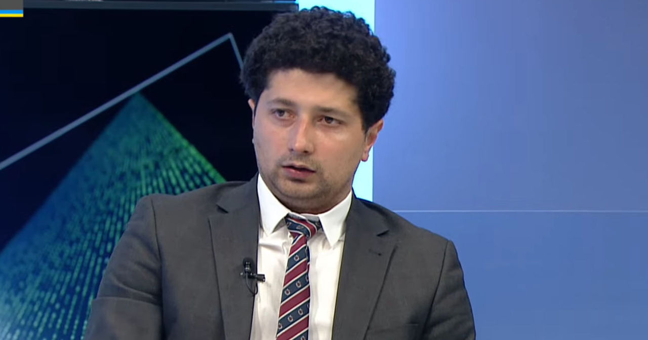 Депутат PAS Раду Мариан.