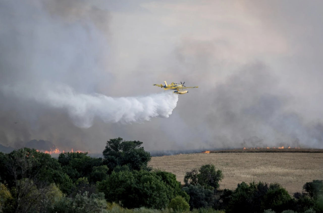 Madrid, acoperit de un nor de fum din cauza unui incendiu de pădure din apropiere.