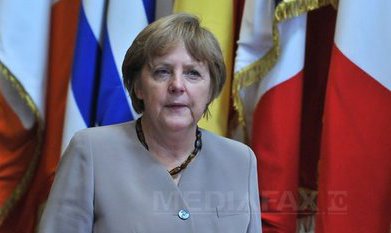 Merkel a cedat teren: Liderii UE înlesnesc condiţiile finanţării de criză pentru Spania şi Italia (Imagine: Mediafax Foto/AFP)