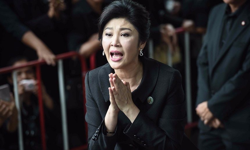 Fosta șefă de guvern din Thailanda ar fi fugit din țară pentru a scăpa de închisoare.