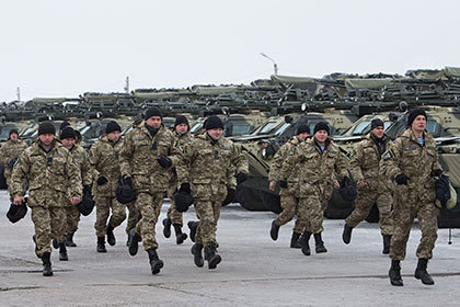 Отвод военной техники для создания 30-километровой зоны безопасности начнется на востоке Украины 26 декабря.