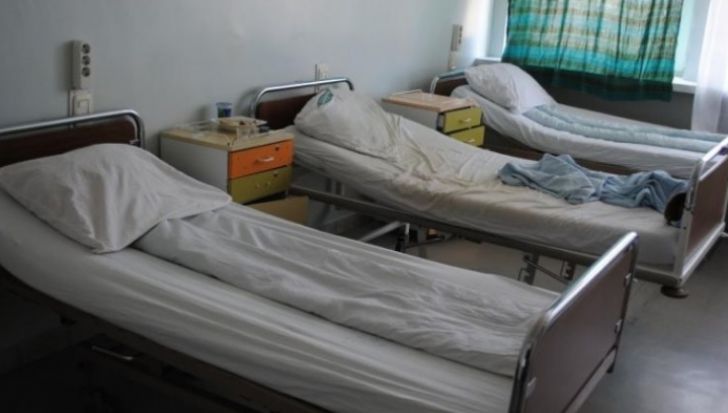 O pacientă bolnavă de cancer a murit după ce a luat gripă din spital