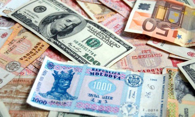Ce a cauzat aprecierea leului moldovenesc în raport cu dolarul şi euro.