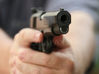 SONDAJ: Majoritatea americanilor susţin în continuare dreptul constituţional de a purta arme (Imagine: Mediafax Foto/AFP)