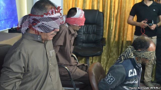 Membri ai grupării Statului Islamic arestați în Irak. Foto: europalibera.org