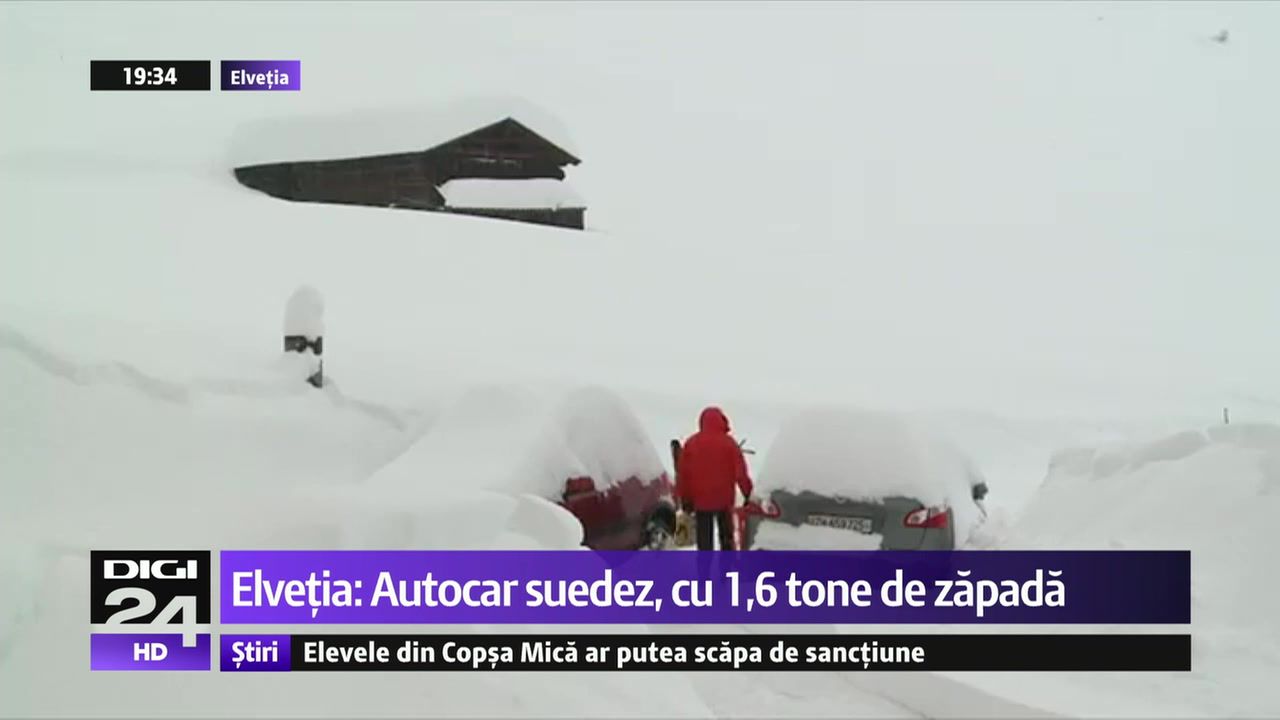 Autocar cu 1,6 tone de zăpadă pe plafon, descoperit de polițiștii elvețieni pe stradă.
