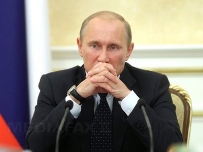 Putin a ajuns cu întârziere de 90 de minute în Israel. Preşedintele Rusiei, aşteptat cu onoruri militare (Imagine: Mediafax Foto/AFP)