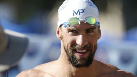 Phelps a ajuns la un total de 25 de medalii olimpice, dintre care 21 de aur. Foto: swimmingworldmagazine.com