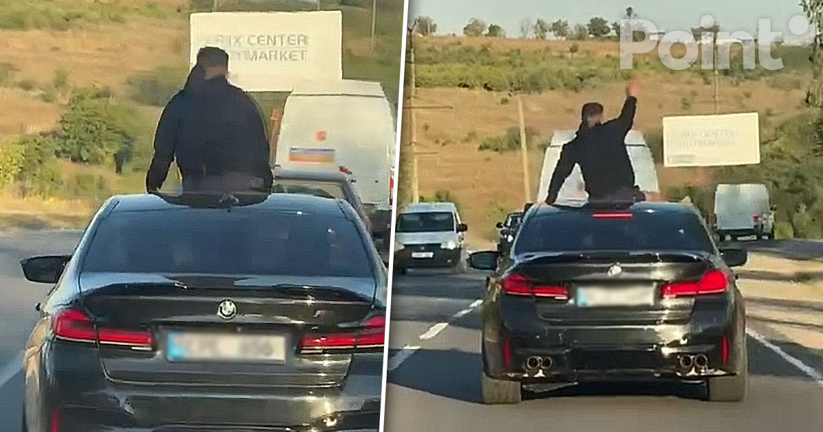 Un tânăr pe acoperișul unui BMW, surprins în trafic la nordul țării
