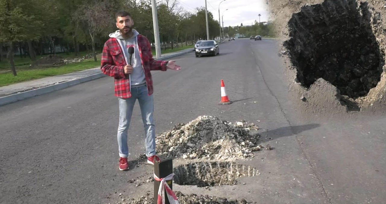 На улице Албишоара на свежеуложенном асфальте пробурили огромную яму.