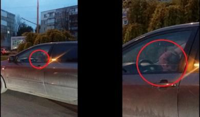 Cum a fost pedepsit un șofer surprins cu un copil la volan 