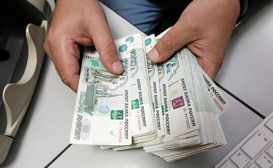 К 2020 году количество россиян с ежемесячным располагаемым доходом выше $1 тыс. вырастет на 70%. Фото: reuters.com