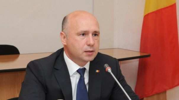Pavel Filip a transmis femeilor cele mai sincere felicitări. Foto: evz.ro