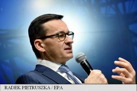 Polonia: Ministrul finanțelorva conduce guvernul conservator naționalist
