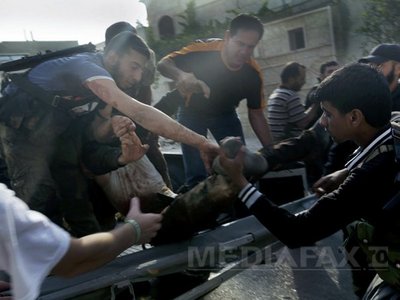 Cel puţin 26 de susţinători ai regimului sirian au fost ucişi vineri (Imagine: Mediafax Foto/AFP)