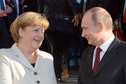 Ангела Меркель и Владимир ПутинФото: Clemens Niehaus / Zuma / Global Look