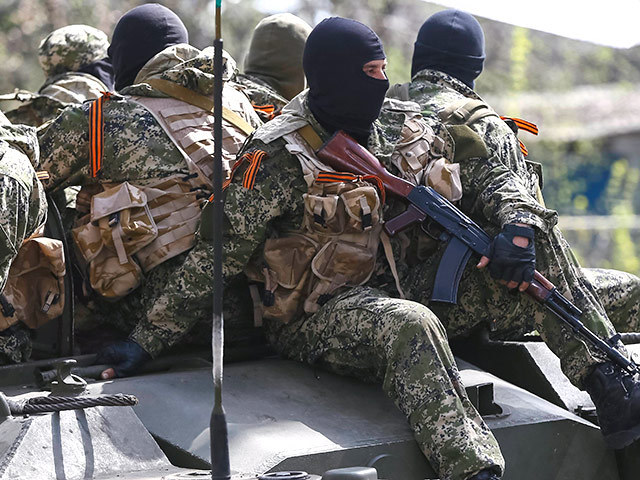 Миссия ОБСЕ на Украине в воскресенье начинает в Донецке переговоры с сепаратистами о сдаче оружия. Фото: Reuters