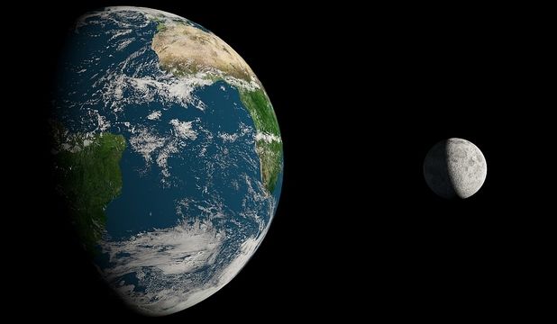 Cum arată Pământul şi Luna de la 64 milioane de kilometri depărtare.