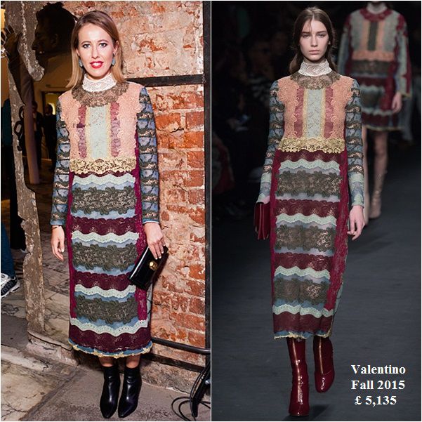 Собчак пришла на мероприятие в платье-футляре Valentino, украшенном полосками из кружева разных оттенков.