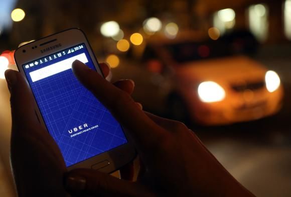 Fraudă cu carduri bancare furate: 2 şoferi români Uber, condamnaţi. Foto: digo24.ro