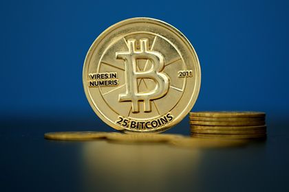 Биткоин — цифровая криптовалюта, созданная в 2008 году.