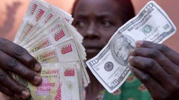 Criză de bani cash în Zimbabwe. Băncile au impus limita de 15 dolari pe zi