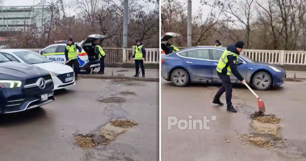 В Кишиневе заметили полицейских, заделывающих ямы на дороге.