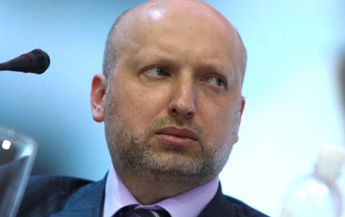 Александр Турчинов посетовал, что террористов на Востоке поддерживает часть местного населения. Фото: AFP