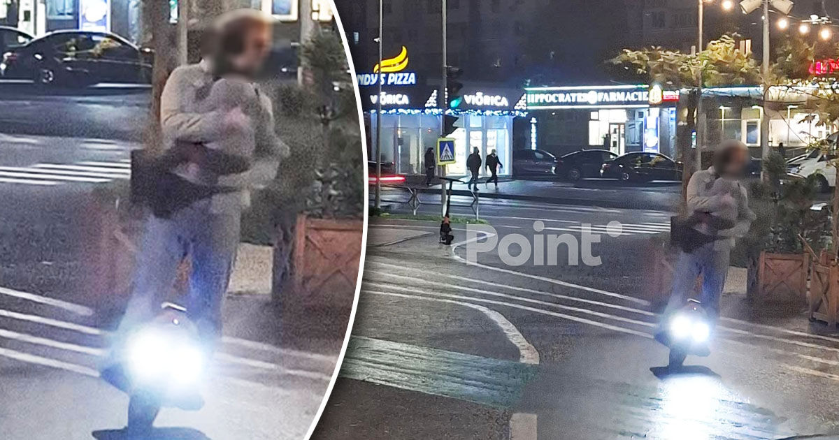 Un bărbat, surprins în timp ce circula pe un monociclu cu un copil mic în brațe în Capitală.