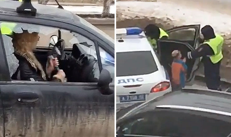 Пьяная россиянка изрубила свою машину топором на глазах у гаишников.