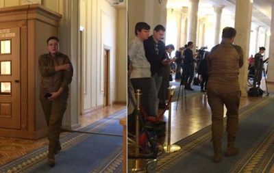 Судя по снимкам, Савченко пришла в Раду в штанах и куртке цвета хаки.
