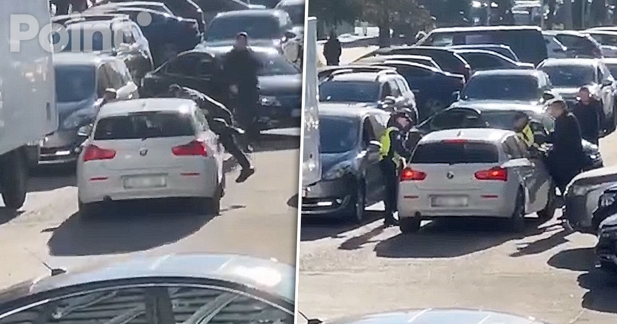 В столице водитель "посадил" на капот авто полицейского.