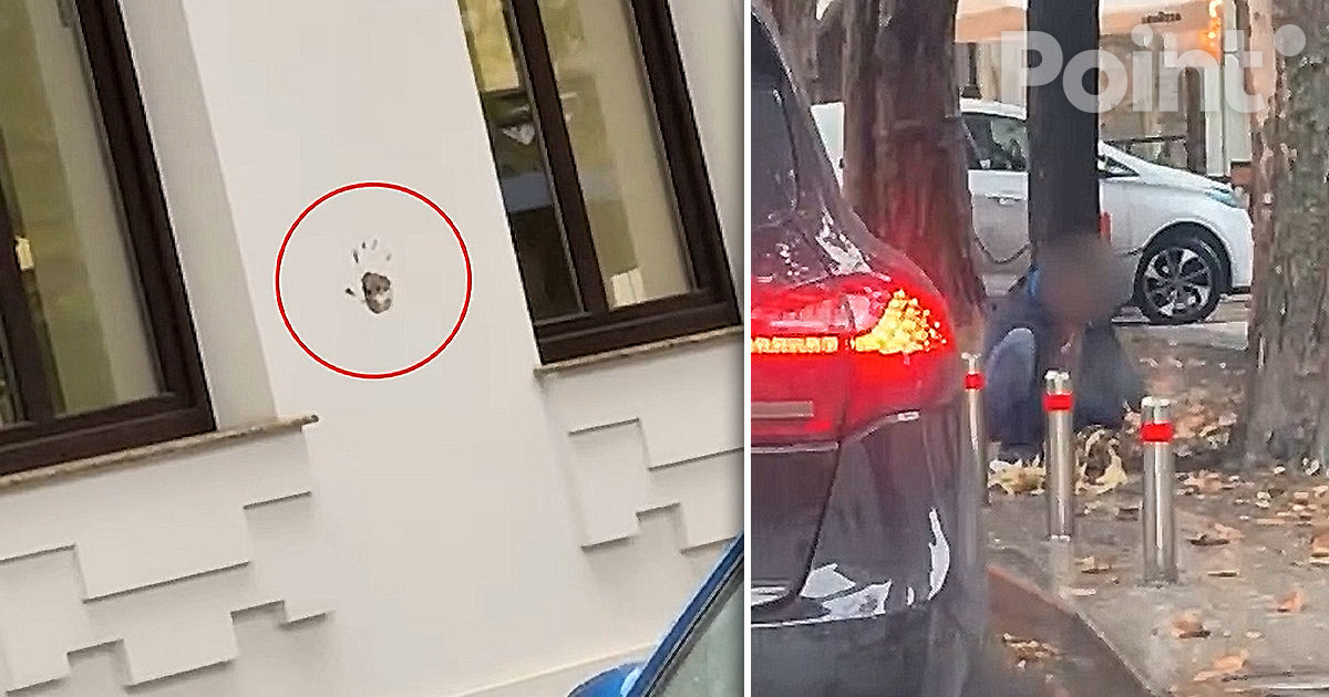 Un bărbat și-a lăsat amprenta mâinii pe peretele unei clădiri din Chișinău.