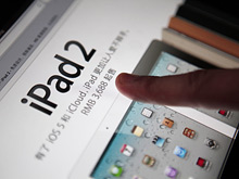 Китайский суд объявил о прекращении тяжбы между Apple и китайской компанией Proview. Фото: Reuters