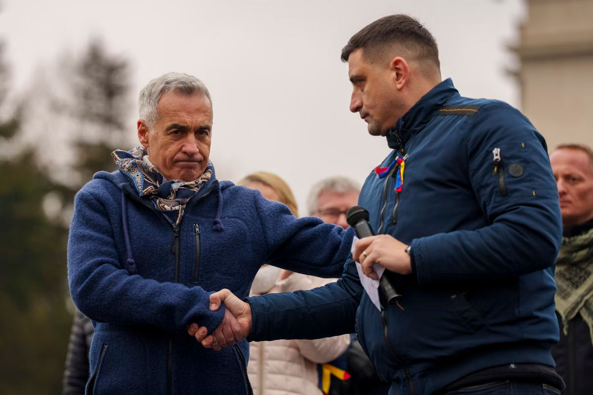 Румынские СМИ: Если падет правительство Боложана, AUR предложит в премьеры Джорджеску.