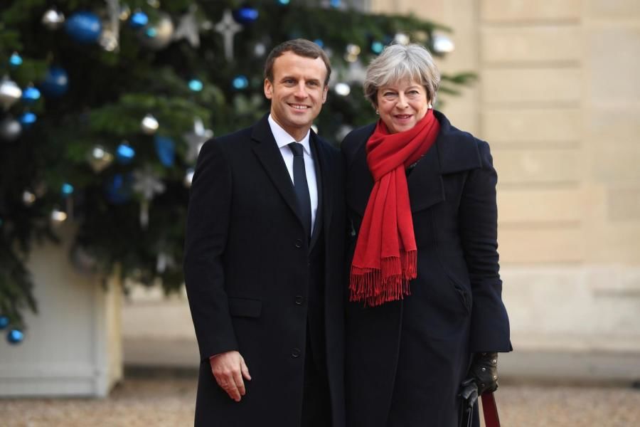 Macron şi May, tratat privind controlul imigraţiei la frontiera comună