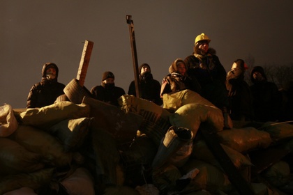 Баррикады в Киеве вечером 23 января 2014 года. Фото: Глеб Гаранич / Reuters